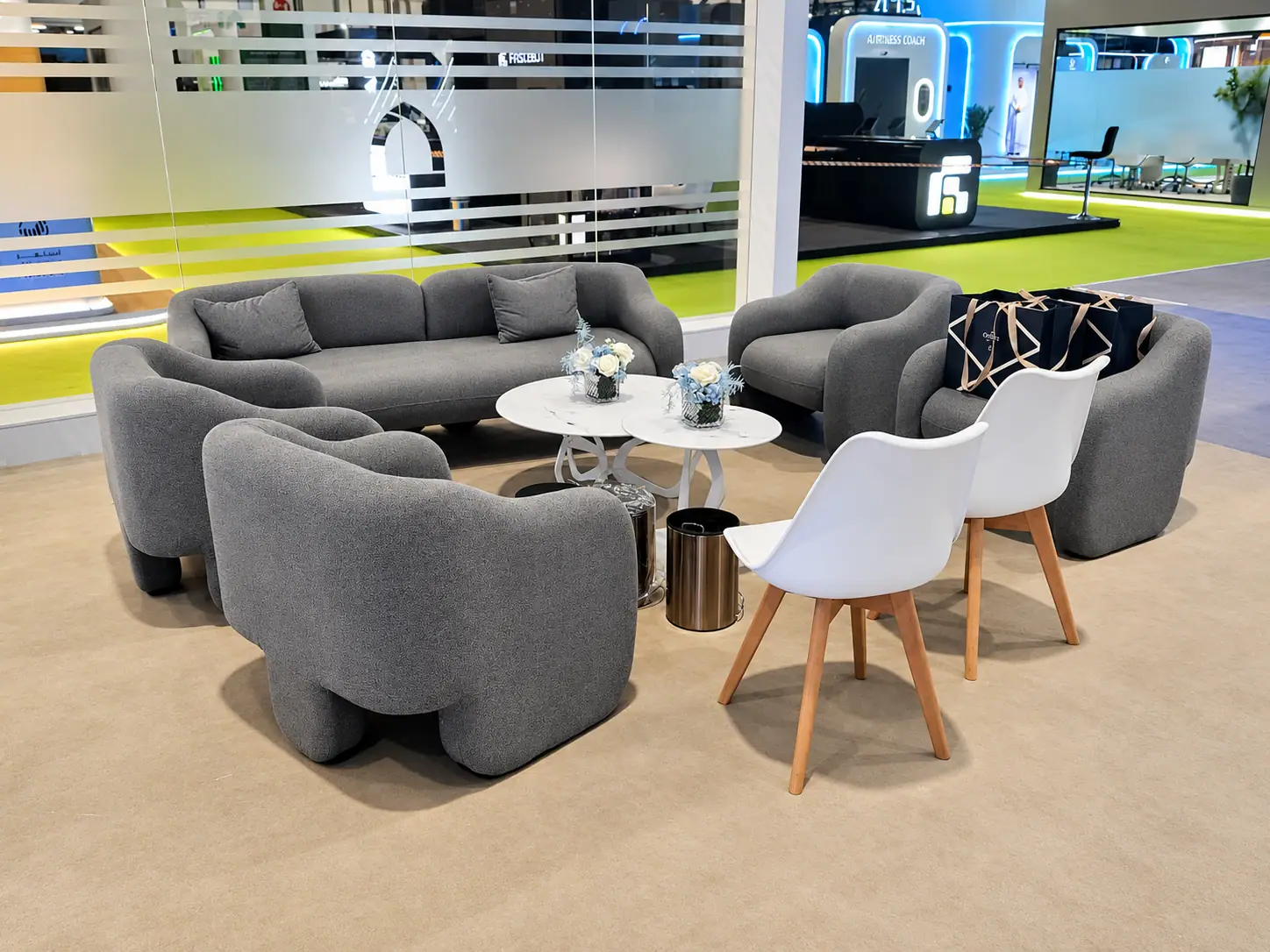 Modern Exhibition Lounge with Floral Tables